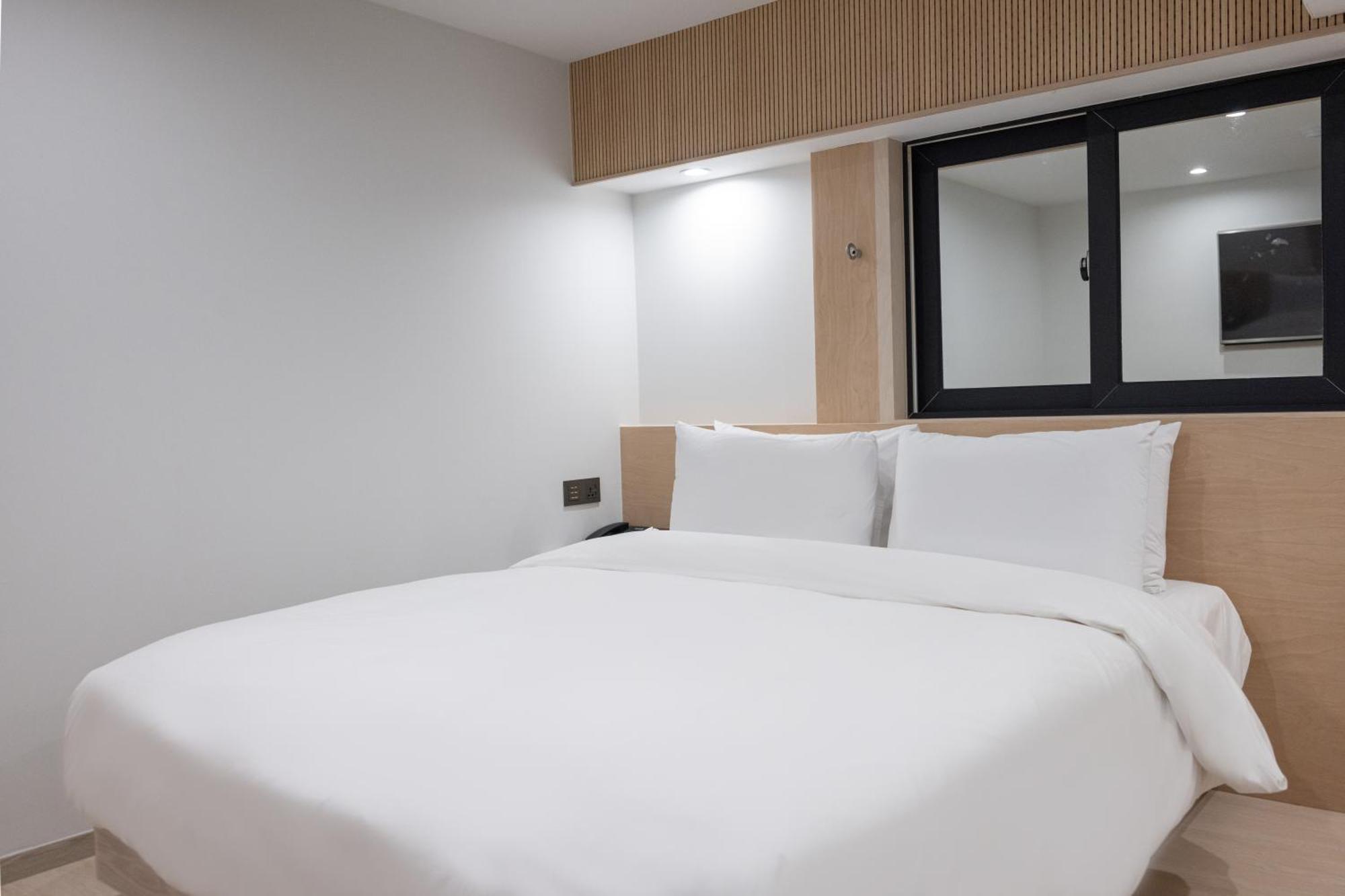 Hotel Bellus Пусан Екстериор снимка